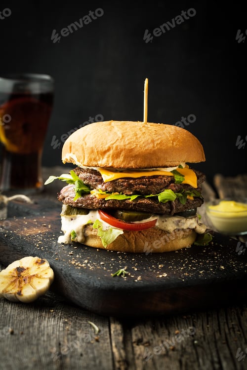 Preview: Delicious double cheeseburger with arugula and sauce