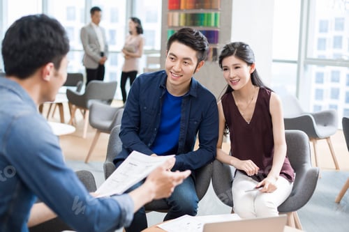 Preview: Business people talking in meeting