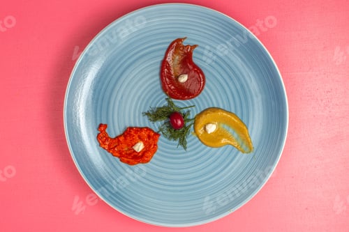Preview: top view different sauces ketchup and mustard inside blue plate with greens on the pink desk food