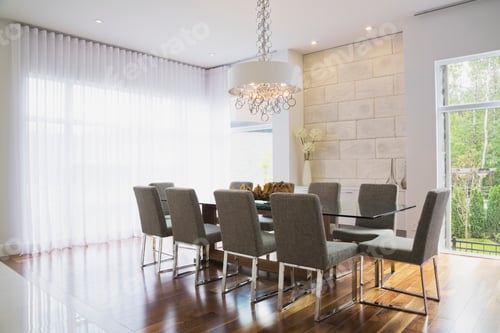 Preview: Modern interior design luxury dining room with glass dining table and grey upholstered dining chairs