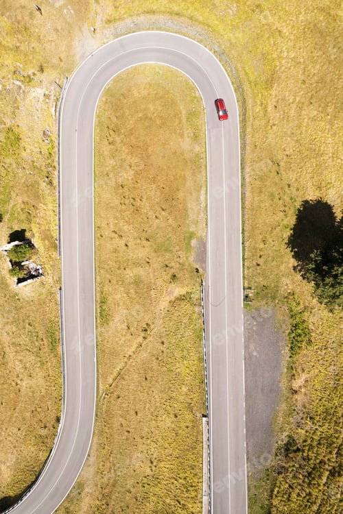 Preview: The curves of a road in the mountains