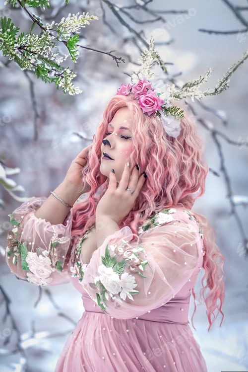 Preview: A spring fairy, a dryad with deer antlers and a crown and a light pink dress in a snowy forest.