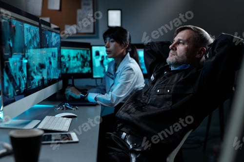 Preview: Guard in front of computer screen