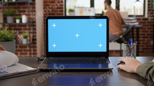 Preview: POV of startup manager typing on laptop with greenscreen