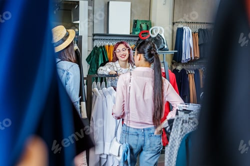 Preview: multicultural hipster young girls shopping in boutique, fashion shopping girls concept