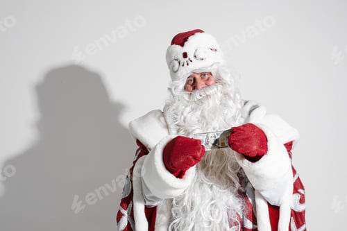 Preview: Father Frost with dollar banknote in hands.