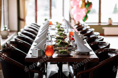 Preview: Beautiful table set for an event party or wedding reception . restaurant interior
