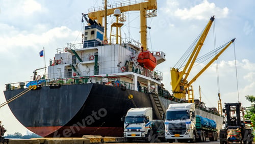 Preview: Export container ship with cranes loading goods on trucks