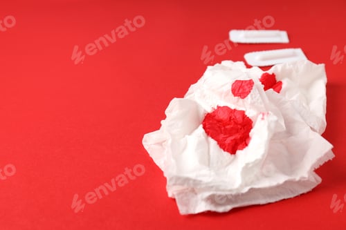 Preview: Concept of healthcare with hemorrhoids accessories on red background