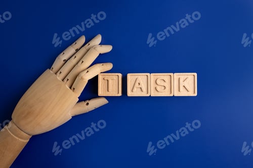Preview: Business concept. TASK - word on wooden cubes on a colorful background