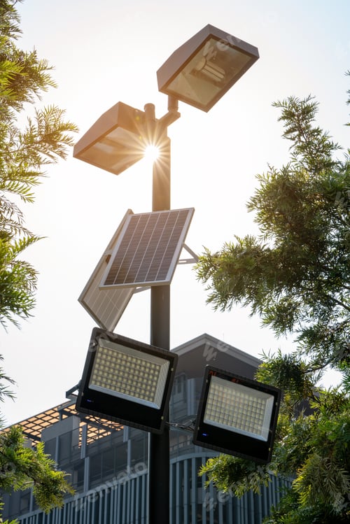 Preview: Solar Light. Public city light with solar panel powered on blue sky with clouds. Park public