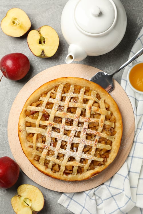 Preview: Composition with apple pie and ingredients on gray background, top view
