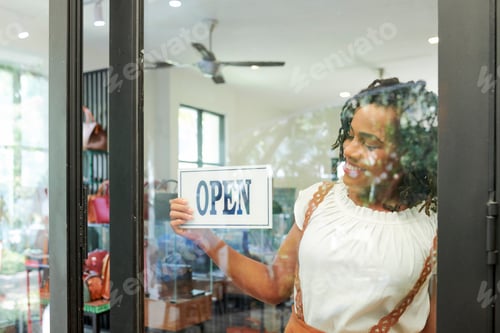 Preview: Shop assistant opening store