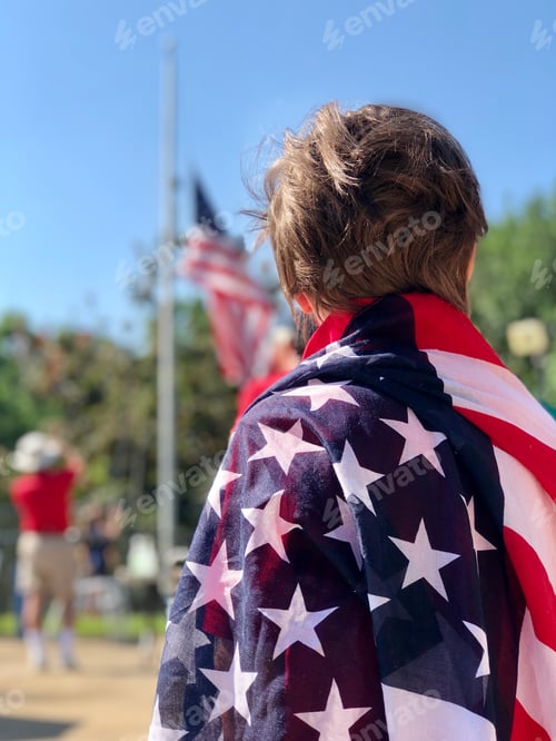 Preview: Child wearing flag at flag raising ceremony
