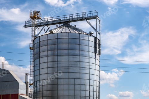 Preview: Modern Granary elevator. Silver silos on agro-processing and manufacturing plant