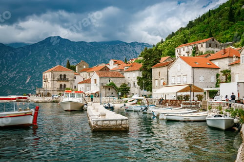 Preview: Small port with pier and boats in the historic town of Perast in Bay of Kotor