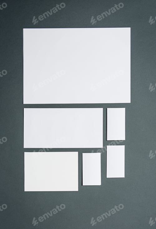 Preview: Mock-up business template with cards, papers. Gray background.