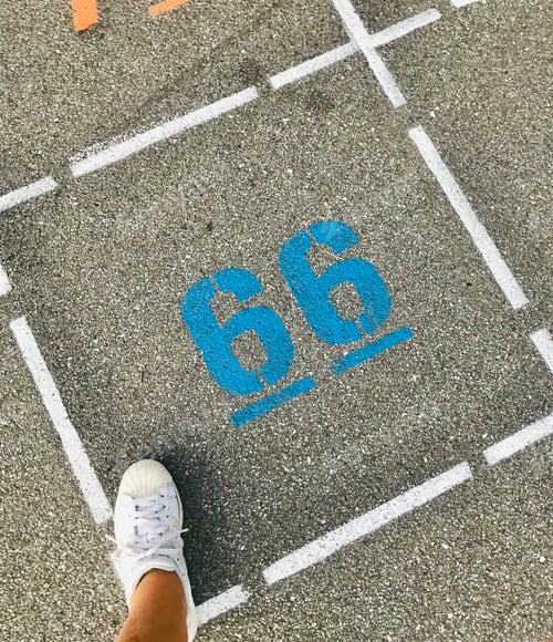 Preview: Number 66 in a square on the asphalt in the playground