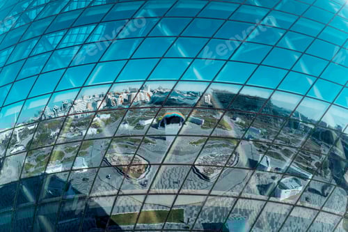 Preview: Close-up of a large glass blue sphere, modern futuristic architecture ball with reflection