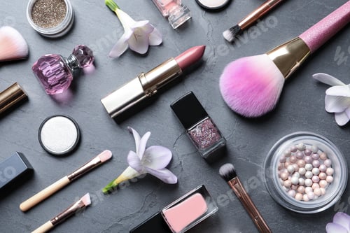 Preview: Many different makeup products and spring flowers on color background, flat lay