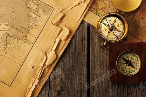 Preview: Antique compass over old map