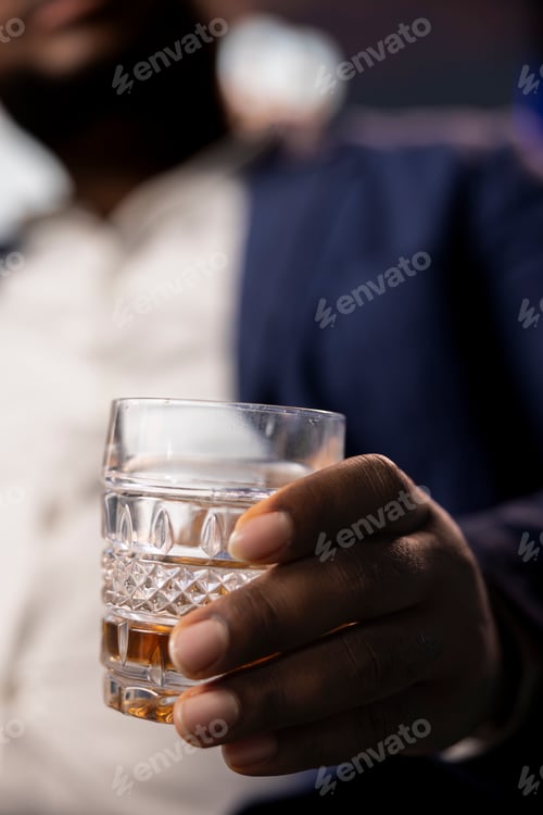 Preview: Professionals in a vintage club engaging in successful negotiation over whiskey
