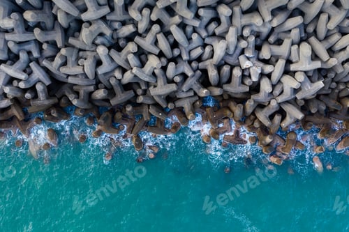 Preview: Top down view of the wave breaker over the sea