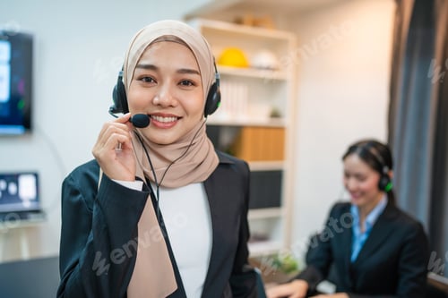 Preview: Friendly smiling woman call center operator with headset using computer.
