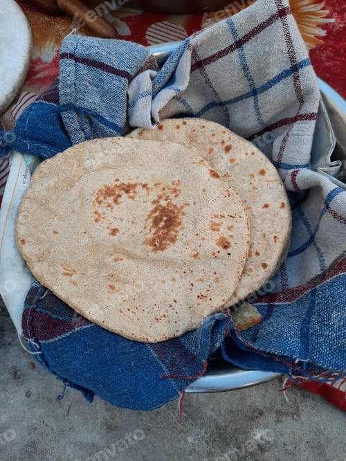 Preview: Freshly baked flatbread on a fabric