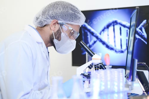 Preview: Scientific research concept. A male chemist in a sterile laboratory,