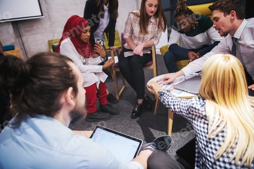 Preview: Multiethnic startup business team having meeting