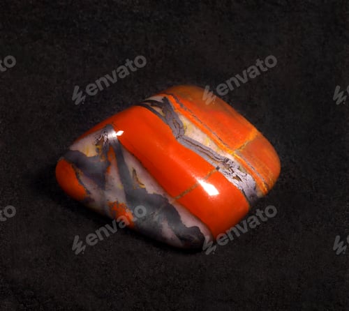 Preview: Jasper polished stone on black background