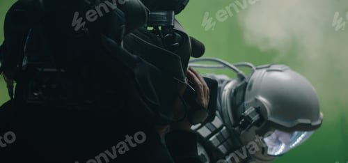Preview: Medium Shot Of A Cameraman Filming A Sci-Fi Scene With A Astronaut Looking Around