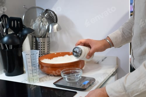 Preview: Measuring Baking Ingredients in a Bright Kitchen Setting