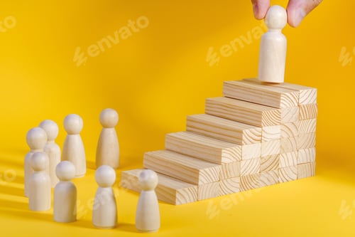 Preview: Businessman climbing stairs. Business success process, career ladder. Wooden figurine