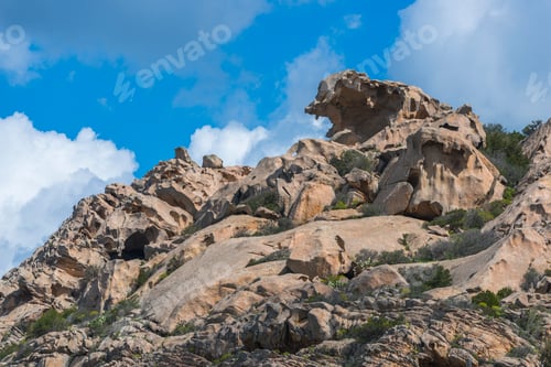 Preview: nature background with rocks and blue sky on sardinia