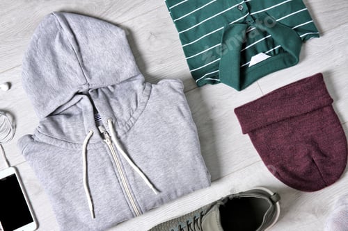 Preview: Set of trendy male clothes and accessories on wooden background, flat lay