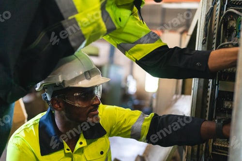 Preview: professional technician engineer working to control electrical power and safety service system