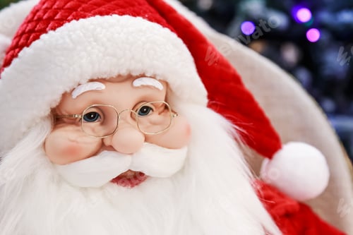 Preview: Portrait of santa claus head with glasses and face with beard toy christmas festive doll close up