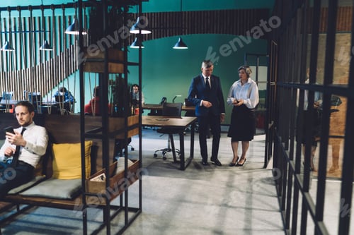 Preview: Group of colleagues in lounge zone