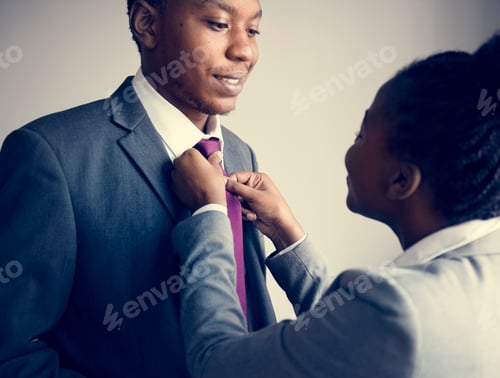 Preview: A couple preparing together before leaving home for work
