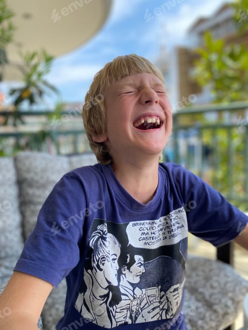 Preview: Boy laughing with open mouth, don’t have teeth