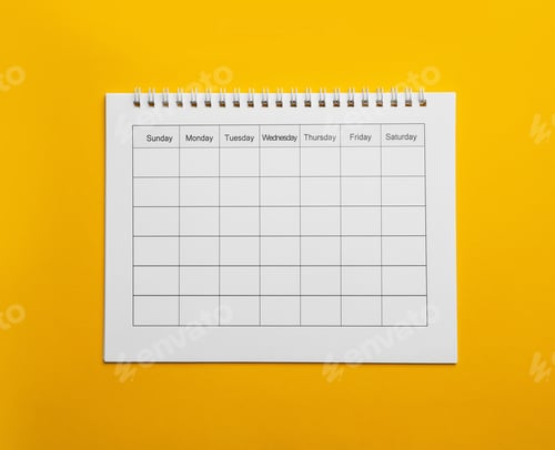 Preview: Blank calendar on yellow background, top view