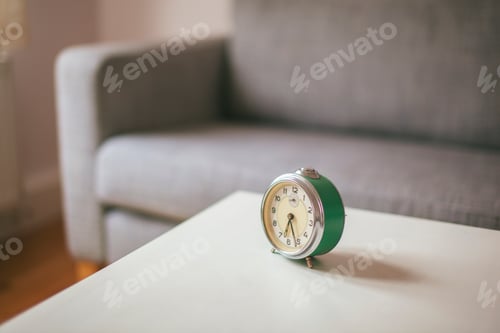 Preview: Alarm clock on coffee table in living room