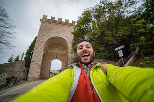 Preview: Tourist In Front Of The Main Entrance Of Assisi, Perugia, Umbria, Italy