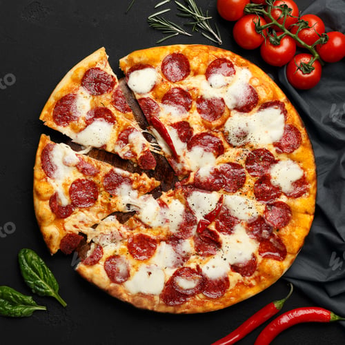 Preview: Hot Sliced Pepperoni Pizza On Black Table