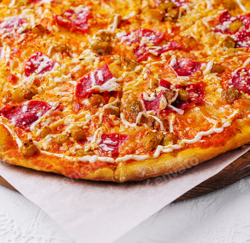 Preview: Pepperoni pizza with sausage on wood background