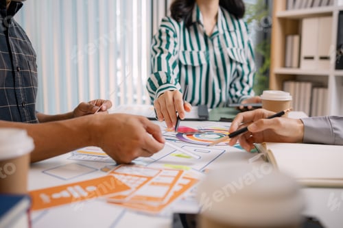 Preview: A group of UX/UI designers brainstorming creative ideas together