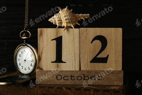 Preview: Columbus Day. Wooden calendar with a shell