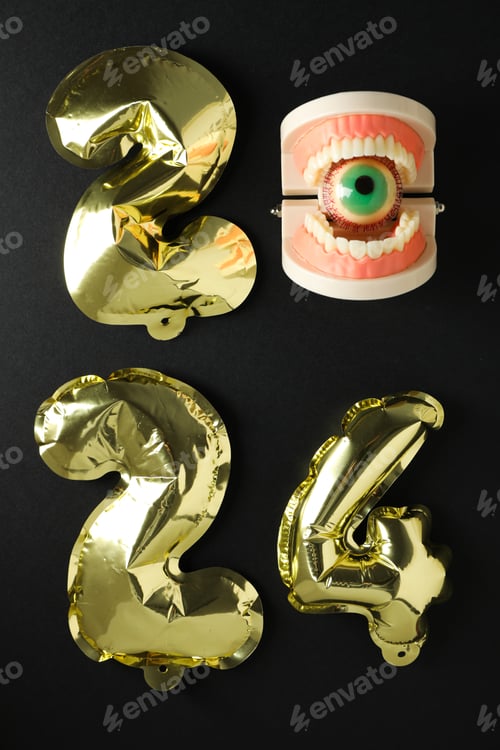 Preview: Teeth with Christmas accessories around, flat lay.